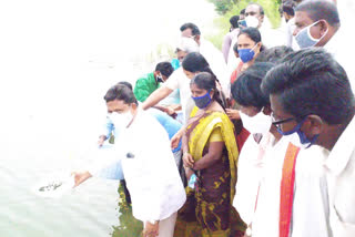 zp chairman kamal raju released fish in madira