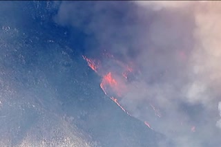 Enormous California wildfire threatens desert homes near LA