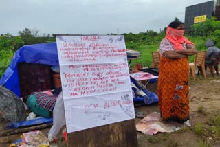 Debits running into lakhs sick children Mother of 5 stands on the road with organ for sale board