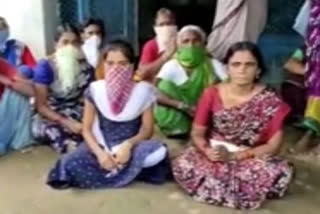 wife protest in front of husbands house in jagtial district