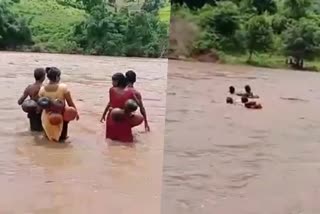 Anganwadi workers cross flooded river dangerously to attend duty in Odisha