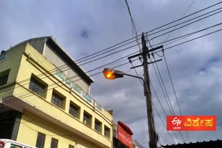 streetlights burning during the day