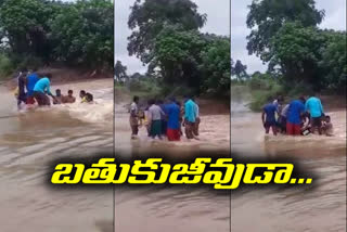 a man safely reached to home after drown in river at bhadradri kothagudem
