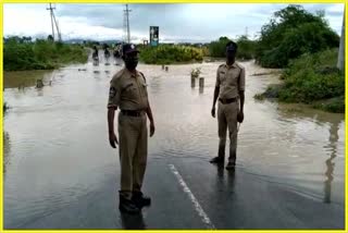 heavy flood water in kotella vagu at thullur in guntur district