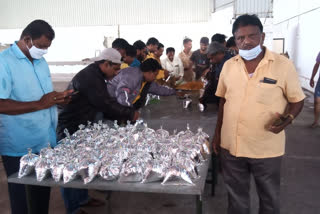 Distribution of food packets to people in the lowlands