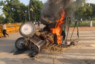 Youth Congress workers torch tractor during protest near India Gate