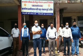 Employees protest by tying black band