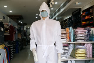 PPE Kits displayed on mannequins