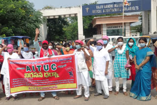 nurses protest in front of adilabad rims hospital