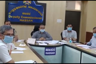 minister sudhakar video conference with hassan officials