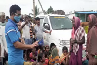 The villagers crowded the Tahsildar car in Naragunda...