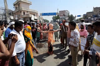 jhajjar workers protest against up govt on hathras case