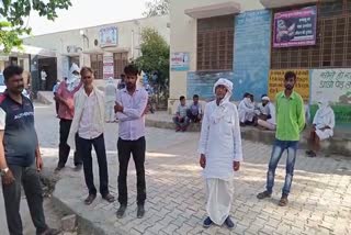 Villagers gathered after finding the dead body