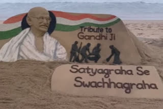 Sudarshan Pattnaik's sand art tribute to Mahatma Gandhi