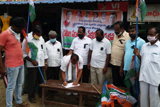 protest against central formers acts by congress in khammam district