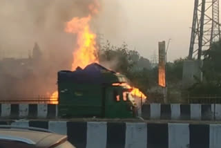 Junk fire on the side of the highway at mukarba chowk