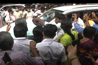 Activists   fell on a flower  pot  when DK Shivakumar  visited Hubli