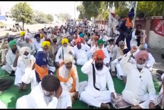 Farmers' organizations stage a dharna at Moga railway station