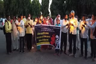 workers take out candle march against Hathras gang rape in Hisar