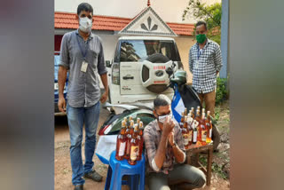 The young man was caught with foreign liquor being smuggled on a scooter  സ്‌കൂട്ടറിൽ കടത്തുകയായിരുന്ന വിദേശ മദ്യവുമായി യുവാവിനെ പിടികൂടി  കണ്ണൂർ  വിദേശ മദ്യം