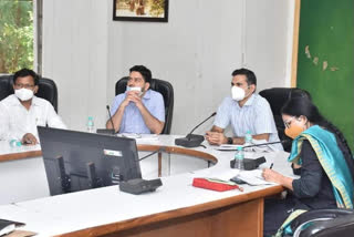 Bhopal collector  in review meeting