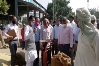 Haryana Warehouse Chairman Nayanpal Rawat inspects Palwal Grain Market