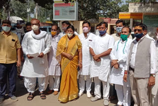 Protesters at district office