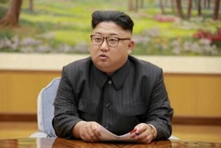 kim jong un in military parade says grateful not a single person in north korea had contracted coronavirus