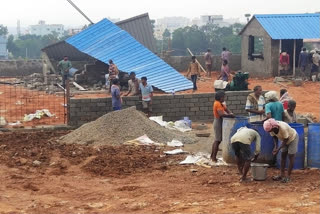 Temple staff removing illegal structures