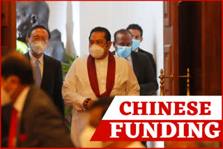 Yang Jiechi, Director of the Central Foreign Affairs Commission of the Chinese Communist Party (center left) and Sri Lankan Prime Minister Mahinda Rajapaksa (center right) arrive for a meeting in Colombo, Sri Lanka, on Friday.