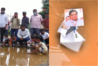 Innovative protest by driving a boat in the road pit