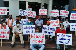 Members of the opposition sitting outside the gathering