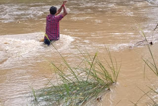 A Teacher risked his life to reach school