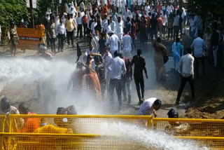 Water splashes on Congress workers