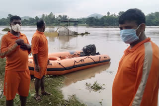 The NDRF team searching for the young man