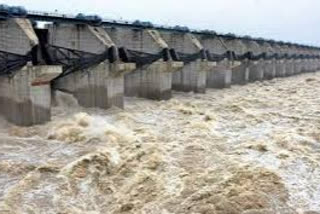 flood continues to  krishna river