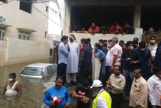 telangana minister kt rama rao and asaduddin owaisi inspected flood hit areas in hyderabad