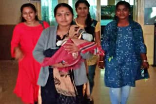 hubli woman wrote exam with her just born baby