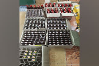300 contraband liquor bottles