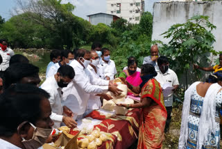 groceries distribution to the flood victims at serilingampally  in hyderabad