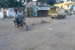 electric-cement-pillar-in-the-middle-of-the-road-in-vijayapura