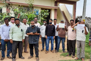 current employees protest at madakasira office