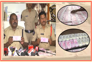 fake currency notes have been caught in guntur by cops