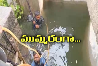 officers trying to open fox sagar lake floodgates in hyderabad