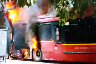 dtc bus caught fire at shadipur metro station delhi