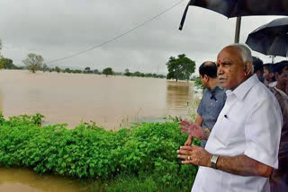 Karnataka CM surveys flood-hit districts, assures more aid