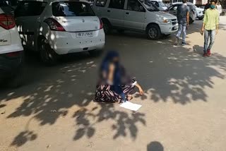 woman protested outside Jind SP office