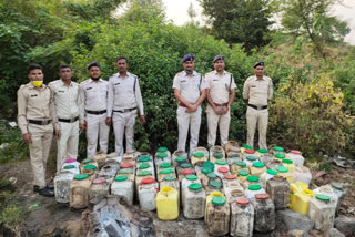 Two accused arrested with raw liquor