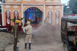 durga_puja_pandal_was_sanitaised_by_fire_briged_in_uttar_dinajpur