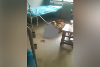 Patient tied to bed at hospital